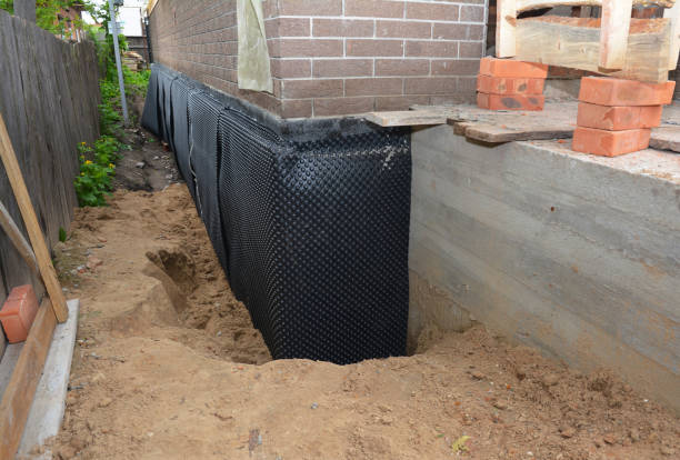 Happy homeowners after waterproofing job in Turon